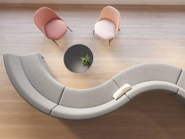 Overhead view of a gray Circa lounge system configuration with two pink chairs and a black table nearby