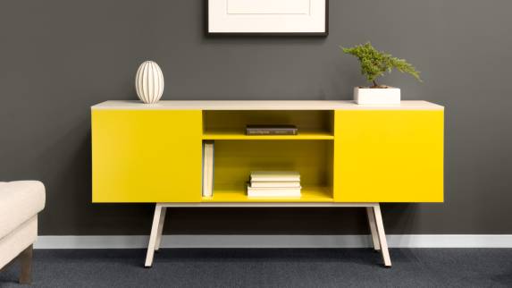 Bright Yellow Bivi Trunk against a wall