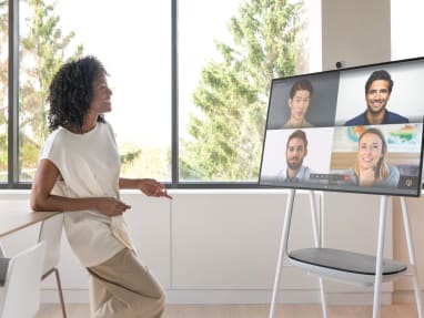 Woman participates in a video conference while using a Steelcase Roam