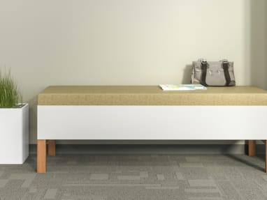 Tan Tava Loveseat, Sofa and Single Chairs around a White Coffee Table in a waiting room