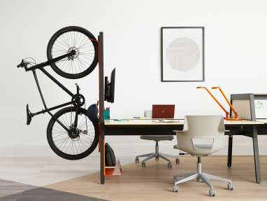 Workstation equipped with Turnstone Bivi Dual Height with a Turnstone Bivi Bike Hook and gray Steelcase Shortcut 5-Star Chair