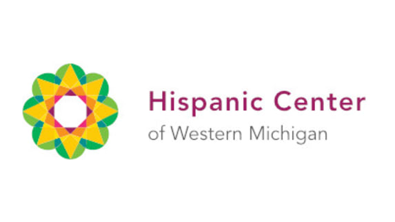 Hispanic Center of Western Michigan logo with a flower