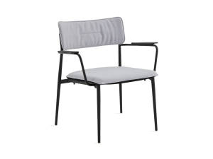 simple lounge chair with white cushion and black base