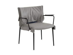 simple lounge chair with gray cushion and black base