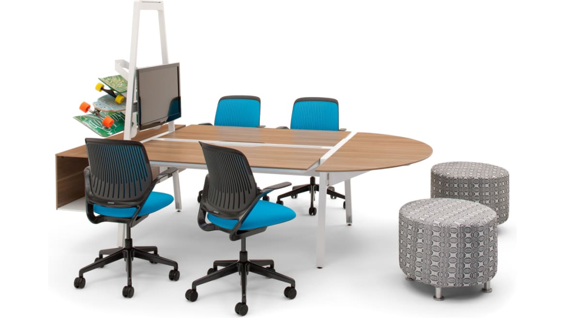 White Turnstone Bivi Board Rack attached to a Turnstone Bivi Table with trunk surrounded by black and blue Steelcase Cobi chairs on white background.